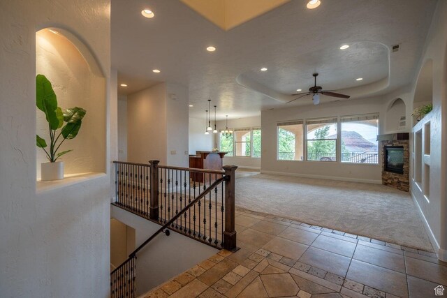 2104 S Corral Way, Washington, UT 84780 - hallway with an upstairs landing, carpet, baseboards, recessed lighting, and a raised ceiling
