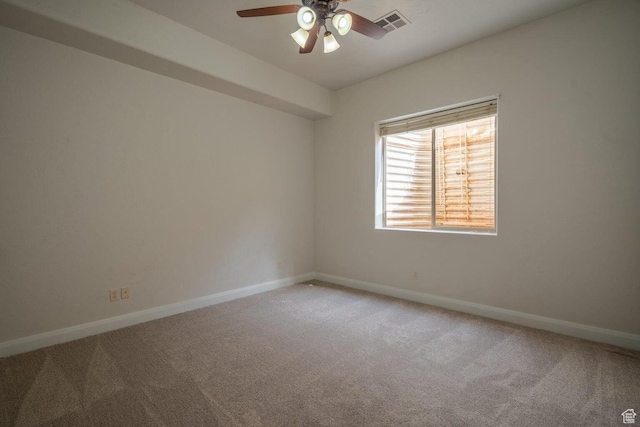 2104 S Corral Way, Washington, UT 84780 - unfurnished room with light carpet, baseboards, visible vents, and ceiling fan