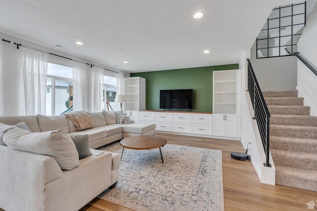1031 S 950 W, American Fork, UT 84003 - living room featuring stairway, light wood finished floors, and recessed lighting