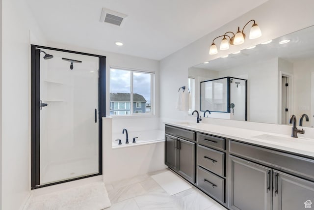 1031 S 950 W, American Fork, UT 84003 - bathroom featuring a stall shower, double vanity, a garden tub, marble finish floors, and recessed lighting