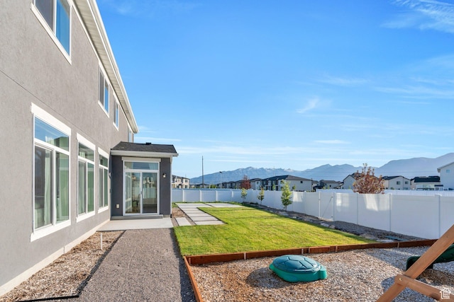 1031 S 950 W, American Fork, UT 84003 - view of yard featuring a mountain view, a patio area, and a residential view