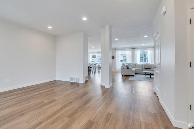 1031 S 950 W, American Fork, UT 84003 - living room with light wood-style floors, recessed lighting, and baseboards