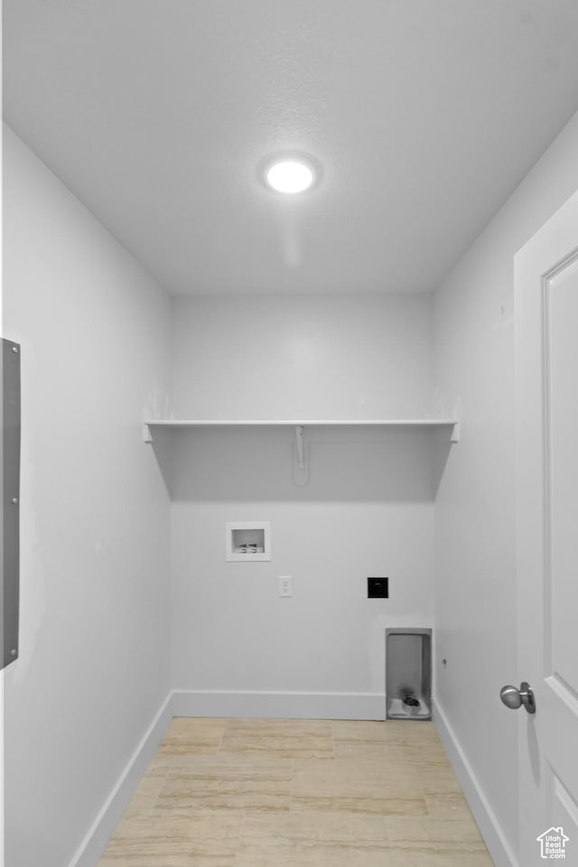 3205 N 3500 W Unit 378, Plain City, UT 84404 - washroom featuring baseboards, laundry area, hookup for an electric dryer, and hookup for a washing machine