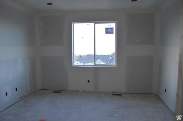 spare room with visible vents