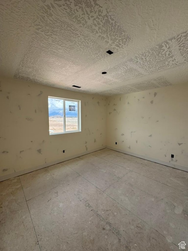 1708 S 4300th St W Unit 102, West Weber, UT 84401 - empty room featuring a textured ceiling
