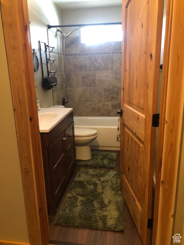 11741 E 14330 N Unit 232, Mount Pleasant, UT 84647 - bathroom with bathtub / shower combination, toilet, vanity, and wood finished floors