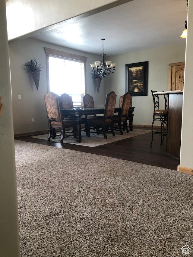 11741 E 14330 N Unit 232, Mount Pleasant, UT 84647 - dining area featuring baseboards, wood finished floors, and a chandelier