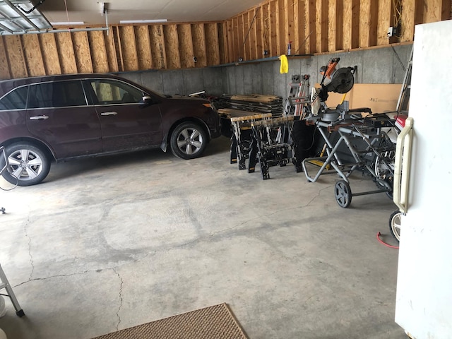 11741 E 14330 N Unit 232, Mount Pleasant, UT 84647 - garage featuring freestanding refrigerator