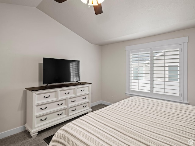 4981 W Longboat Ln, Herriman, UT 84096 - bedroom featuring baseboards, vaulted ceiling, ceiling fan, and dark carpet