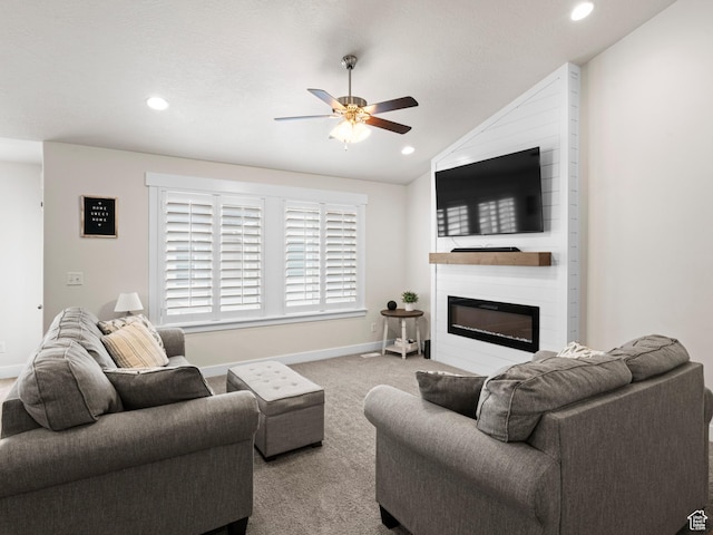 4981 W Longboat Ln, Herriman, UT 84096 - living room with vaulted ceiling, carpet flooring, baseboards, a large fireplace, and ceiling fan