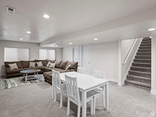4981 W Longboat Ln, Herriman, UT 84096 - dining room featuring visible vents, baseboards, recessed lighting, stairway, and light carpet