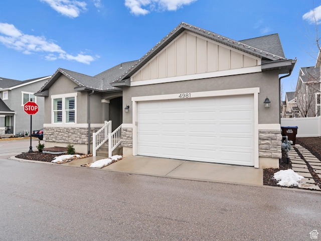 4981 W Longboat Ln, Herriman, UT 84096 - ranch-style home with concrete driveway, stucco siding, fence, stone siding, and a garage
