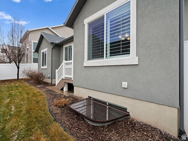 4981 W Longboat Ln, Herriman, UT 84096 - view of property exterior with stucco siding and fence