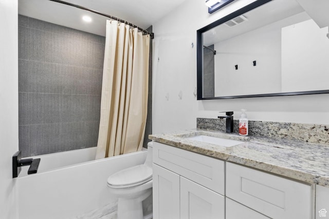 314 W Center St Unit F118, Bountiful, UT 84010 - bathroom featuring visible vents, toilet, shower / bath combo with shower curtain, and vanity