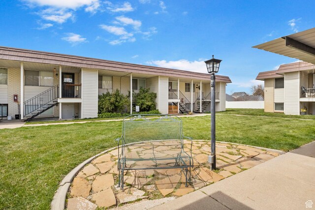 314 W Center St Unit F118, Bountiful, UT 84010 - exterior space with a yard