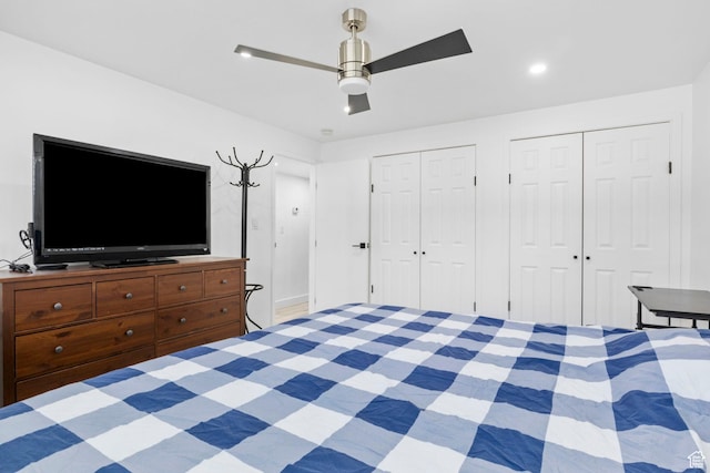 314 W Center St Unit F118, Bountiful, UT 84010 - bedroom featuring a ceiling fan, two closets, and recessed lighting