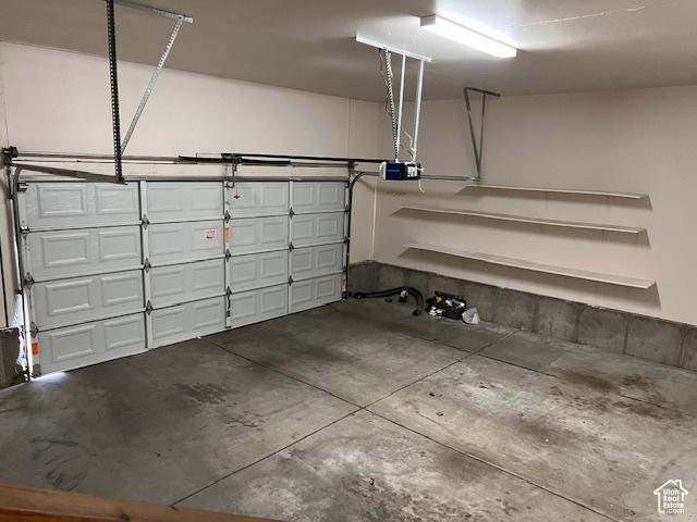 4625 W Harvey Blvd, Cedar Hills, UT 84062 - garage with a garage door opener