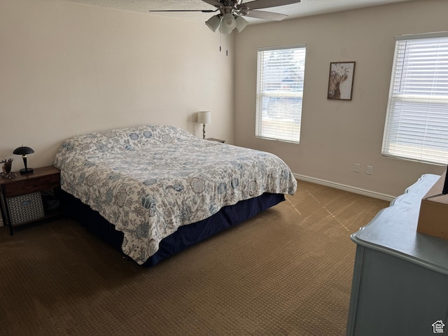 4625 W Harvey Blvd, Cedar Hills, UT 84062 - bedroom with baseboards, ceiling fan, and dark carpet