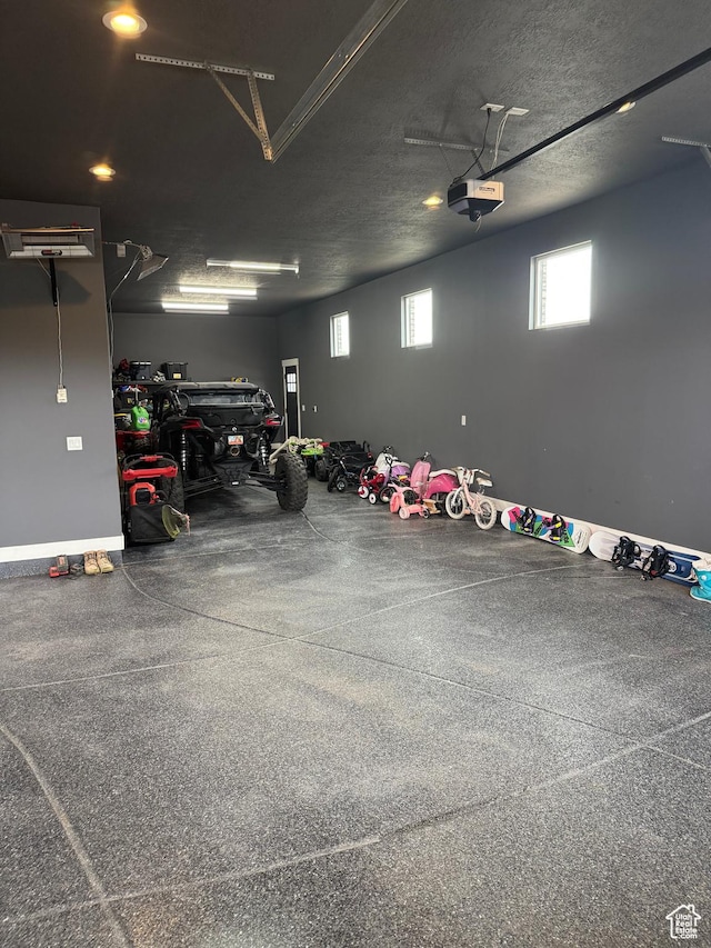 340 E 300 N, Moroni, UT 84646 - garage with a garage door opener and baseboards