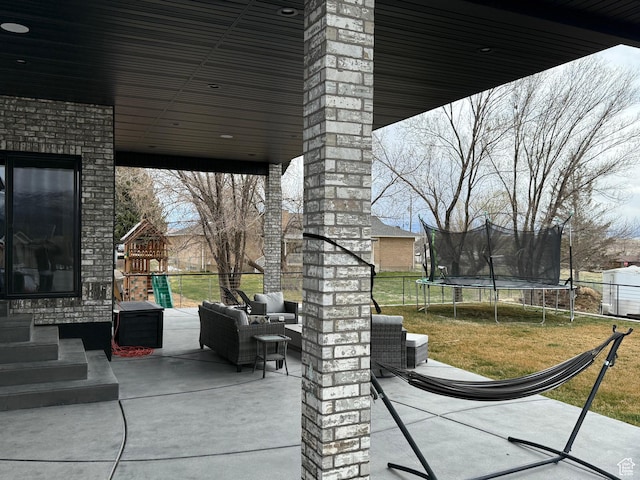 340 E 300 N, Moroni, UT 84646 - view of patio featuring a trampoline, outdoor lounge area, and a playground