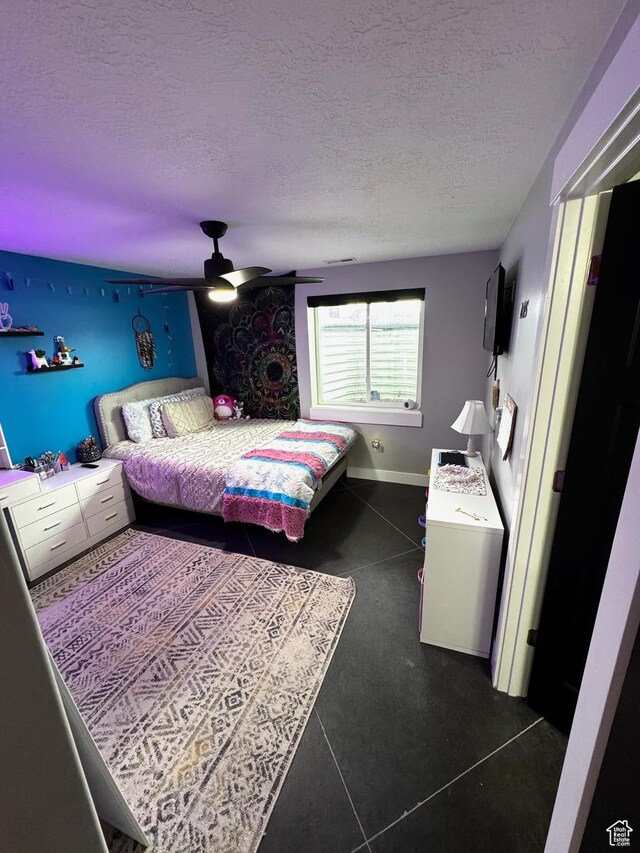 340 E 300 N, Moroni, UT 84646 - bedroom featuring a textured ceiling, a ceiling fan, and baseboards