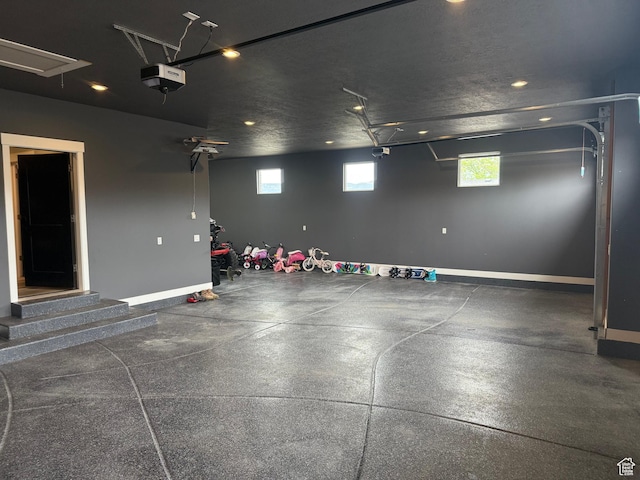 340 E 300 N, Moroni, UT 84646 - garage featuring recessed lighting, a garage door opener, and baseboards