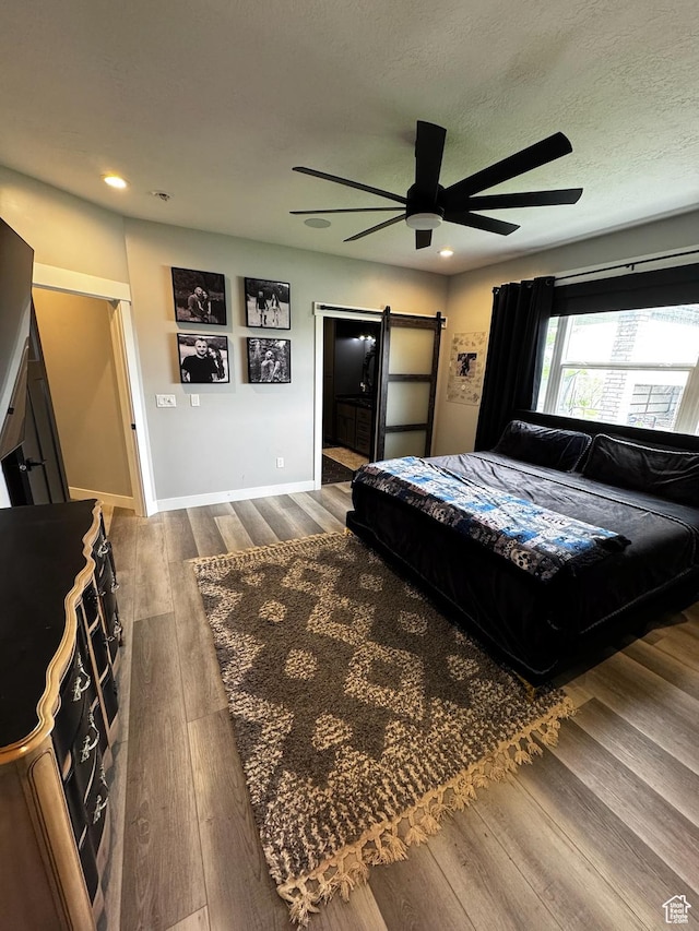 340 E 300 N, Moroni, UT 84646 - bedroom with dark wood-style floors, recessed lighting, baseboards, ceiling fan, and a textured ceiling