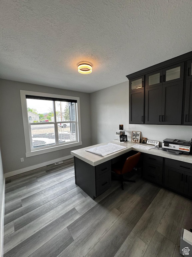 340 E 300 N, Moroni, UT 84646 - office space with wood finished floors, built in study area, and a textured ceiling