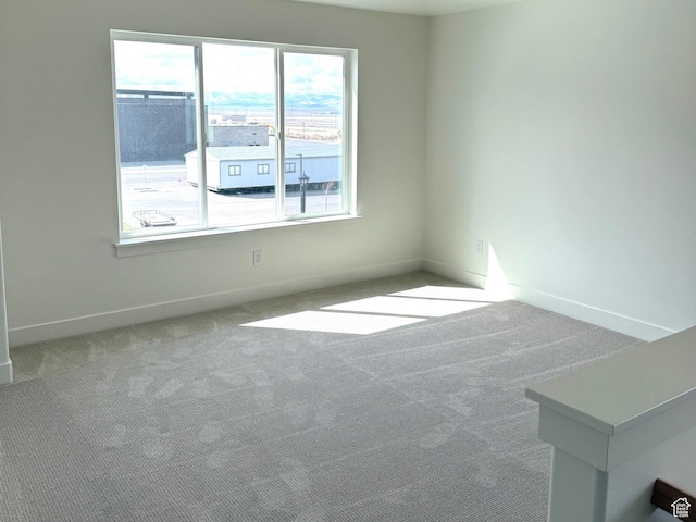 2873 E Liam Ln Unit 105, Eagle Mountain, UT 84005 - spare room with carpet floors and healthy amount of natural light