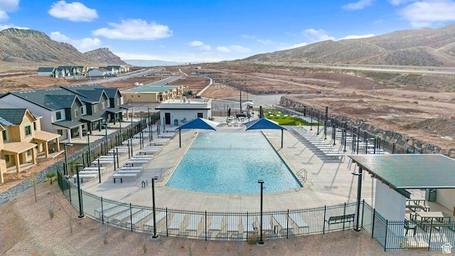 1627 S Ripple Rock Dr Unit 3002, Washington, UT 84780 - view of swimming pool featuring a residential view, a mountain view, and fence