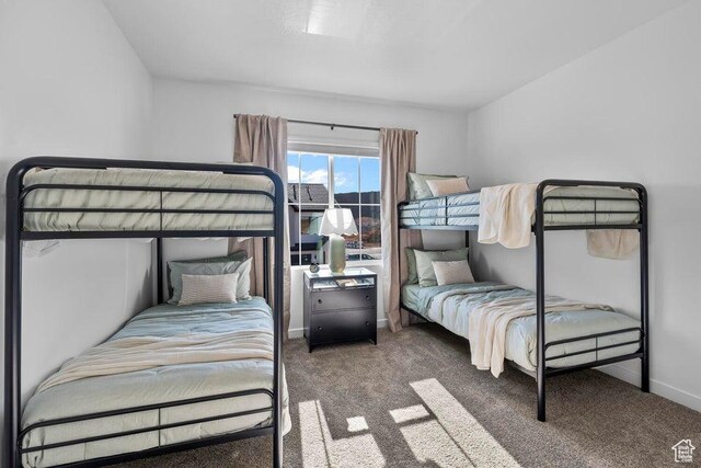 1627 S Ripple Rock Dr Unit 3002, Washington, UT 84780 - carpeted bedroom with baseboards