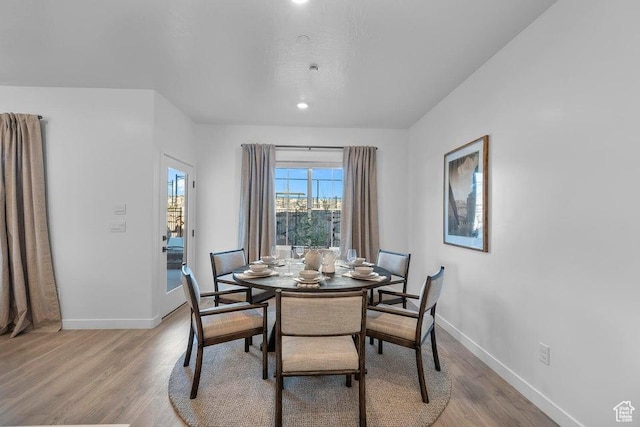 1627 S Ripple Rock Dr Unit 3002, Washington, UT 84780 - dining area with baseboards and light wood-type flooring