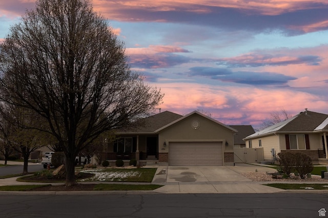 1751 E 1130 S, Spanish Fork, UT 84660 - single story home featuring a garage, driveway, a gate, and brick siding