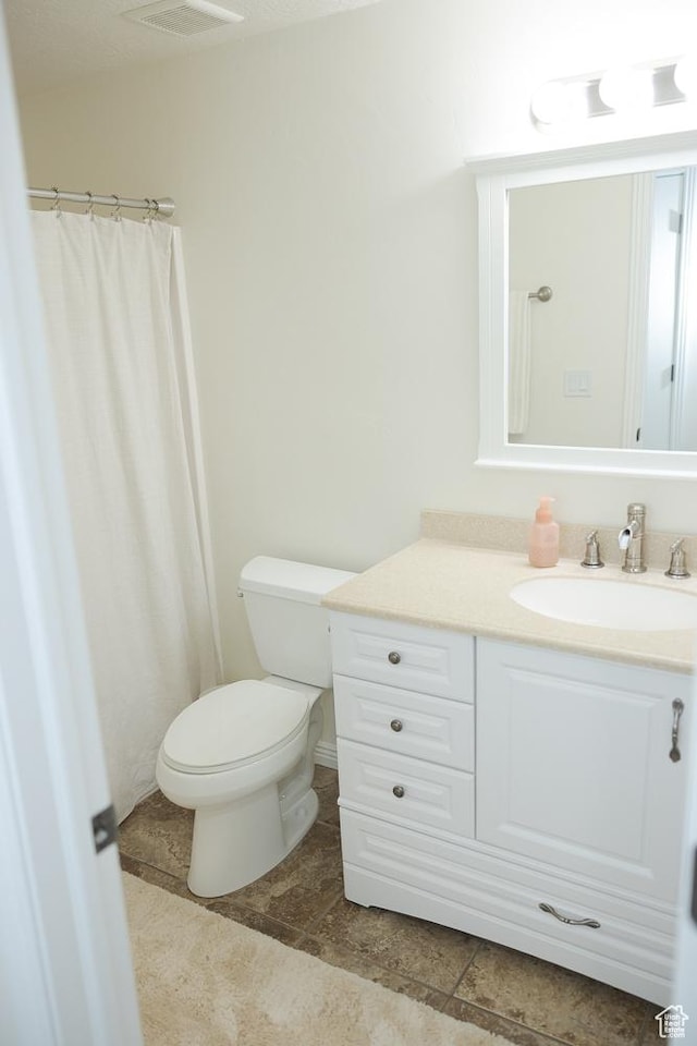 1751 E 1130 S, Spanish Fork, UT 84660 - bathroom featuring toilet, vanity, and tile patterned floors