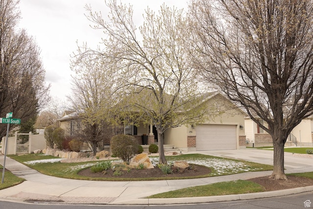 1751 E 1130 S, Spanish Fork, UT 84660 - view of front of house with brick siding, concrete driveway, and a garage
