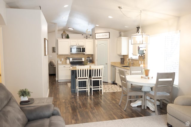 1751 E 1130 S, Spanish Fork, UT 84660 - dining area featuring dark wood-style flooring, lofted ceiling, and recessed lighting