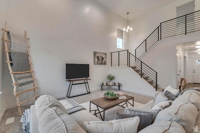 138 N Valcrest Dr, Saratoga Springs, UT 84045 - carpeted living area with baseboards, a high ceiling, and stairway