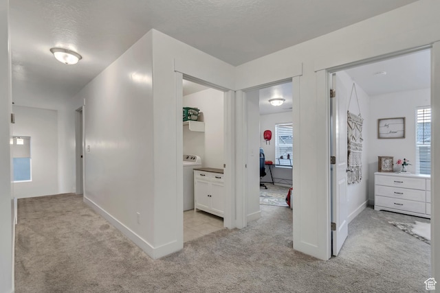 138 N Valcrest Dr, Saratoga Springs, UT 84045 - corridor featuring light colored carpet, baseboards, and a textured ceiling