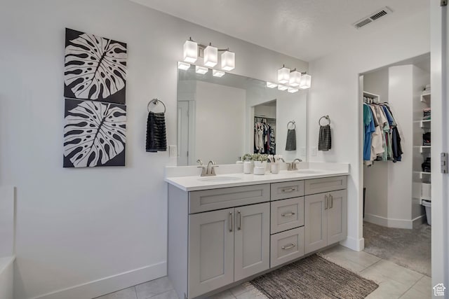 138 N Valcrest Dr, Saratoga Springs, UT 84045 - bathroom featuring tile patterned flooring, a sink, and visible vents