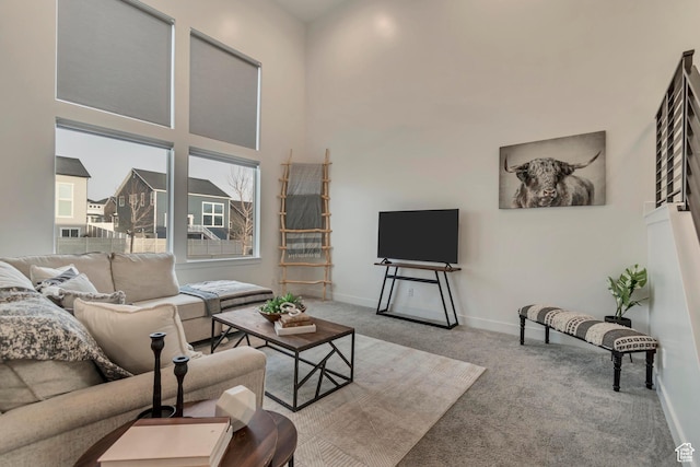 138 N Valcrest Dr, Saratoga Springs, UT 84045 - living room with baseboards, a towering ceiling, and carpet