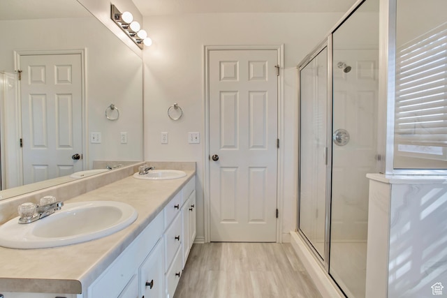 1494 E 1300 S, Provo, UT 84606 - full bath featuring double vanity, a stall shower, and wood finished floors