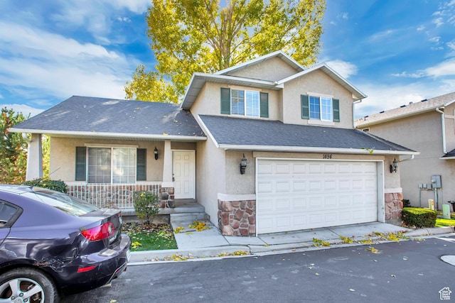 1494 E 1300 S, Provo, UT 84606 - traditional-style house featuring stone siding, stucco siding, a porch, and an attached garage
