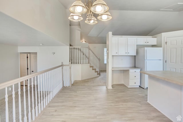 1494 E 1300 S, Provo, UT 84606 - kitchen featuring freestanding refrigerator, white cabinets, light wood finished floors, light countertops, and pendant lighting