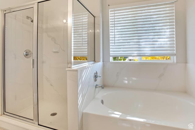 1494 E 1300 S, Provo, UT 84606 - bathroom featuring a bath and a marble finish shower