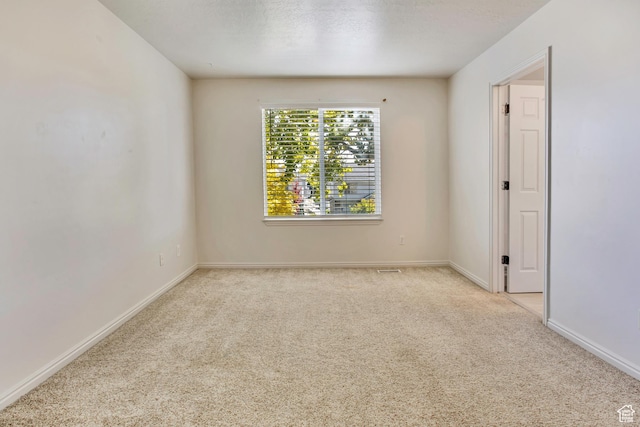 1494 E 1300 S, Provo, UT 84606 - spare room with light colored carpet and a textured ceiling