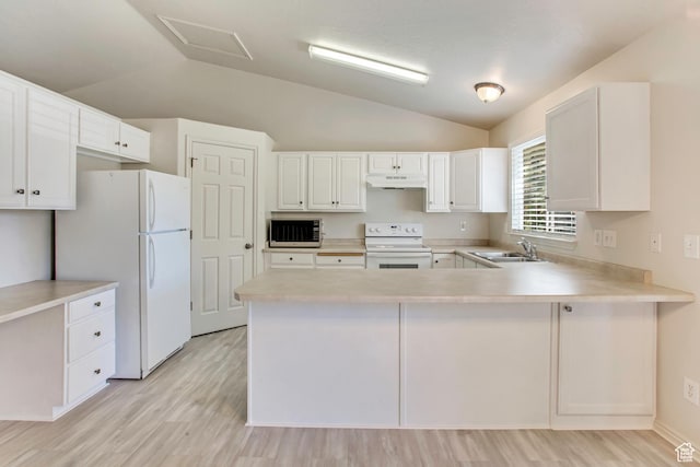 1494 E 1300 S, Provo, UT 84606 - kitchen featuring under cabinet range hood, white appliances, vaulted ceiling, light countertops, and a peninsula