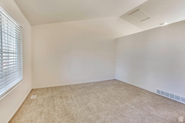 1494 E 1300 S, Provo, UT 84606 - carpeted empty room featuring healthy amount of natural light, vaulted ceiling, and attic access