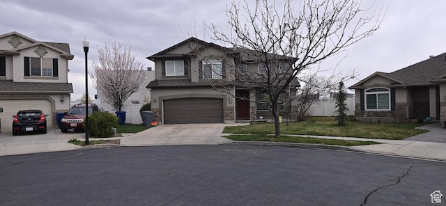 148 N Walton Ct W, North Salt Lake, UT 84054 - view of front facade featuring stone siding, concrete driveway, stucco siding, a front lawn, and a garage