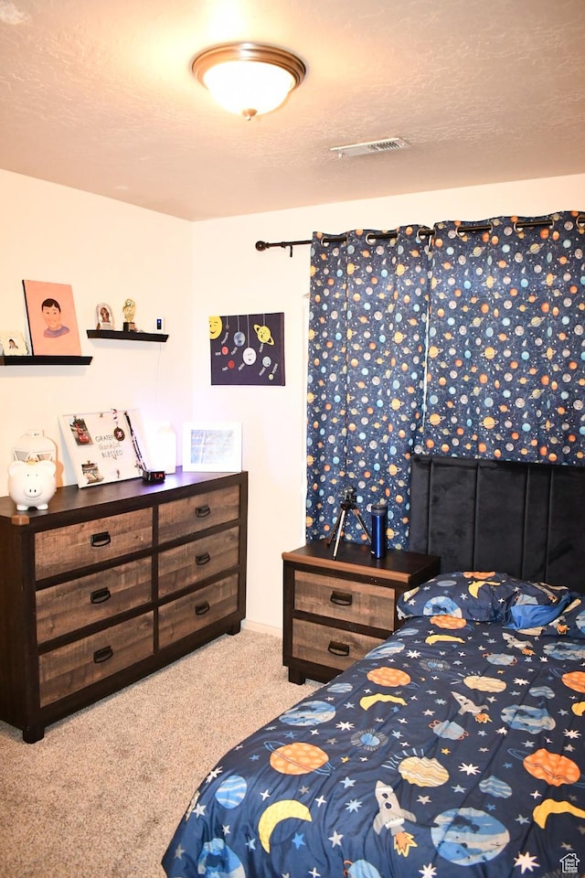 148 N Walton Ct W, North Salt Lake, UT 84054 - carpeted bedroom featuring visible vents and a textured ceiling