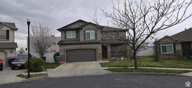 148 N Walton Ct W, North Salt Lake, UT 84054 - traditional-style house with driveway, stucco siding, stone siding, and a front yard